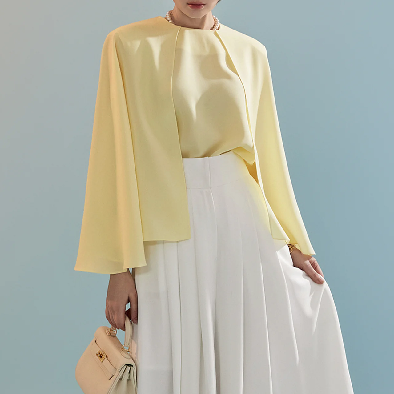 B2723 Sleeveless Cape Design Blouse - Image 2